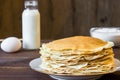 Fresh homemade stack of crepes with ingredients