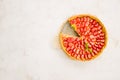 Fresh homemade strawberry shortcrust tart pie stuffed with custard vanilla cream . Sliced berries and mint leaf on the trendy Royalty Free Stock Photo