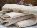 Fresh homemade stuffed wrap sandwich shawerma, burritos closeup