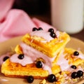 Fresh homemade Viennese waffles, drenched with yogurt and berries Royalty Free Stock Photo