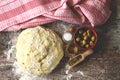 Fresh homemade yeast dough, olives and spices for making focaccia with Italian herbs. Cooking at home. Royalty Free Stock Photo