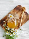 Fresh honey chamomile flower delicious wooden background