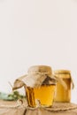 fresh honey closed jar wooden surface. High quality photo