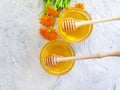 Fresh honey flower calendula dessert composition  on a gray concrete background Royalty Free Stock Photo