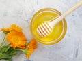 Fresh honey flower refreshment calendula nutrition on a gray concrete background Royalty Free Stock Photo