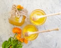 Fresh honey flower calendula nutrition on a gray concrete background Royalty Free Stock Photo