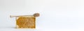 Fresh honey in a mini frame stands on a white background. Reserve vitamins for the winter Royalty Free Stock Photo
