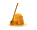 Fresh honeycomb with dipper on white background Royalty Free Stock Photo