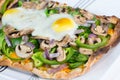 Fresh, hot baked vegetarian flatbread pizza. Royalty Free Stock Photo