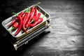 Fresh hot chili pepper on scales. Royalty Free Stock Photo