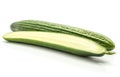 Fresh hothouse cucumber on white