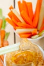 Fresh hummus dip with raw carrot and celery Royalty Free Stock Photo