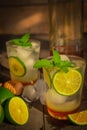 Fresh Ice Honey Lemon soda drink on the wood table there are lemon slice, ice, honey in glass bottle and wooden honey dipper Royalty Free Stock Photo