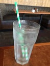 Fresh ice water green striped straw Royalty Free Stock Photo