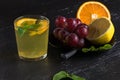 Fresh iced lemonad with slice of grape fruit on dark background Royalty Free Stock Photo
