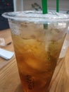 Fresh iced tea with a distinctive aroma of tea leaves, giving a cool sensation and refreshing pleasure with every sip.