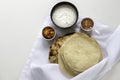 Fresh Indian flat breads Naans and poppadums served on the white cloth Royalty Free Stock Photo