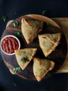 The Fresh Indian Hot snack samosa served with red chutney