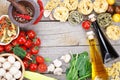 Fresh ingredients for cooking: pasta, tomato and spices Royalty Free Stock Photo