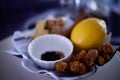 Fresh ingredients for turmeric tea. Turmeric root, ginger, lemon, cinnamon, black pepper corn, honey and coconut oil. Royalty Free Stock Photo