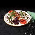 Fresh italian caprese salad with Mozzarella cheese with tomato, Pesto and balsamic sauce. photo for the menu. Royalty Free Stock Photo