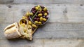 Fresh italian ciabatta with olive oil on a wooden board with olives, herbs Royalty Free Stock Photo