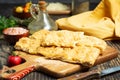 Fresh Italian focaccia bread close up on Durk table Royalty Free Stock Photo