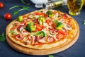 Fresh italian pizza with chicken fillet, mushrooms, ham, salami Royalty Free Stock Photo