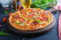 Fresh Italian pizza with chicken fillet, mushrooms, ham, salami Royalty Free Stock Photo