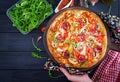 Fresh Italian pizza with chicken fillet, mushrooms, ham, salami Royalty Free Stock Photo