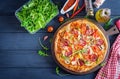 Fresh Italian pizza with chicken fillet, mushrooms, ham, salami Royalty Free Stock Photo