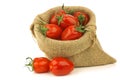 Fresh italian pomodori tomatoes in a burlap bag Royalty Free Stock Photo