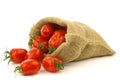 Fresh italian pomodori tomatoes in a burlap bag