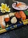 Sushi plate on black granite table