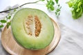 Fresh Japanese Green Melon on Wooden Plate Royalty Free Stock Photo