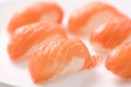 Fresh japanese salmon sushi in plate on white background Royalty Free Stock Photo