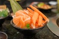 Fresh Japanese Sashimi set in Asian restaurant, orange Salmon and tuna sashimi fish on dish with ice. Japan food concept Royalty Free Stock Photo