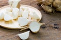 Fresh jicamas on wooden board Royalty Free Stock Photo