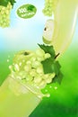 Fresh juice Grape and Apple with splash. Flow of liquid with drops and sweet fruit 3d realistic vector illustration high detail on Royalty Free Stock Photo