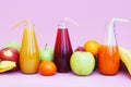 Fresh Juices Red Green Yellow Tropical Fruits Strawberry Apple Kiwi Orange Banana Pine Apple Pomegranate Grape Selective focus Bot Royalty Free Stock Photo