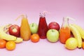 Fresh Juices Red Green Yellow Tropical Fruits Strawberry Apple Kiwi Orange Banana Pine Apple Pomegranate Grape Selective focus Bot Royalty Free Stock Photo