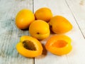 Fresh juicy apricots on a light wooden tabletop Royalty Free Stock Photo