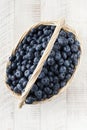 Fresh juicy blueberries in the basket. Wild berries. Royalty Free Stock Photo