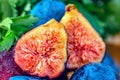 Fresh juicy figs fruit. Macro half a fig. Shallow depth of field. Toned image. Copy space. Art photography. Closeup