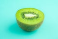 fresh and juicy green kiwi fruit on green pastel colour Royalty Free Stock Photo