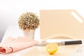 Fresh, juicy lemon on a kitchen cutting board made of artificial stone Royalty Free Stock Photo