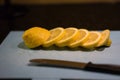 Fresh juicy lemon. Slice thin slices on a cutting board Royalty Free Stock Photo