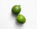 Fresh juicy limes on white background Royalty Free Stock Photo