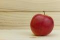 Fresh juicy natural Apple on wooden background