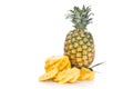 Fresh juicy nutritious cut pineapple with whole fruit as backgro Royalty Free Stock Photo